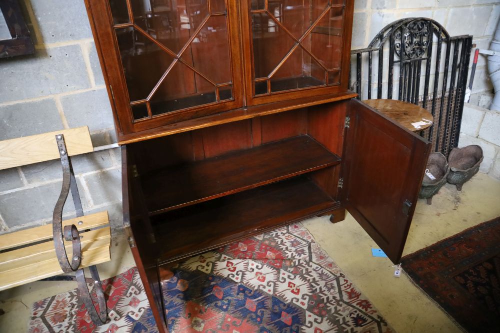 A Georgian style mahogany glazed bookcase, width 116cm, depth 44cm, height 194cm